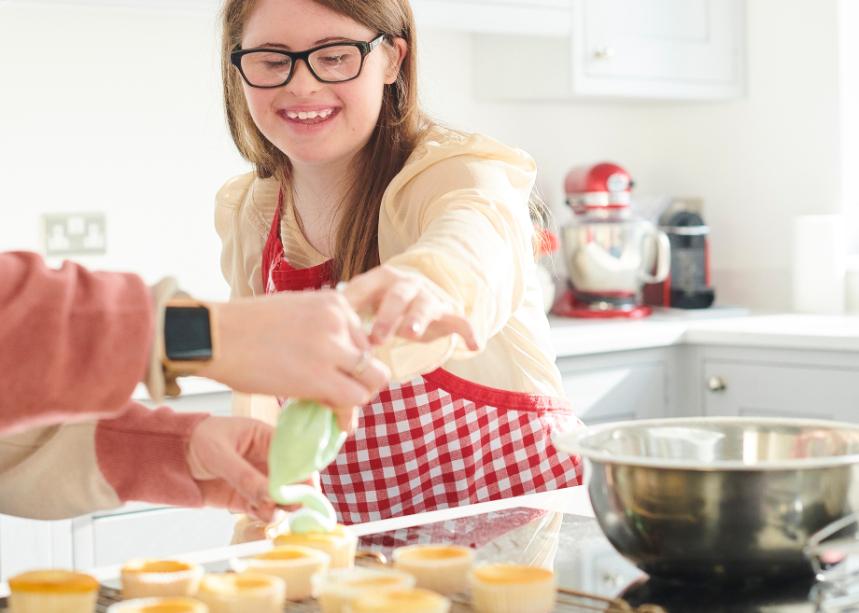 Students learning cooking skills