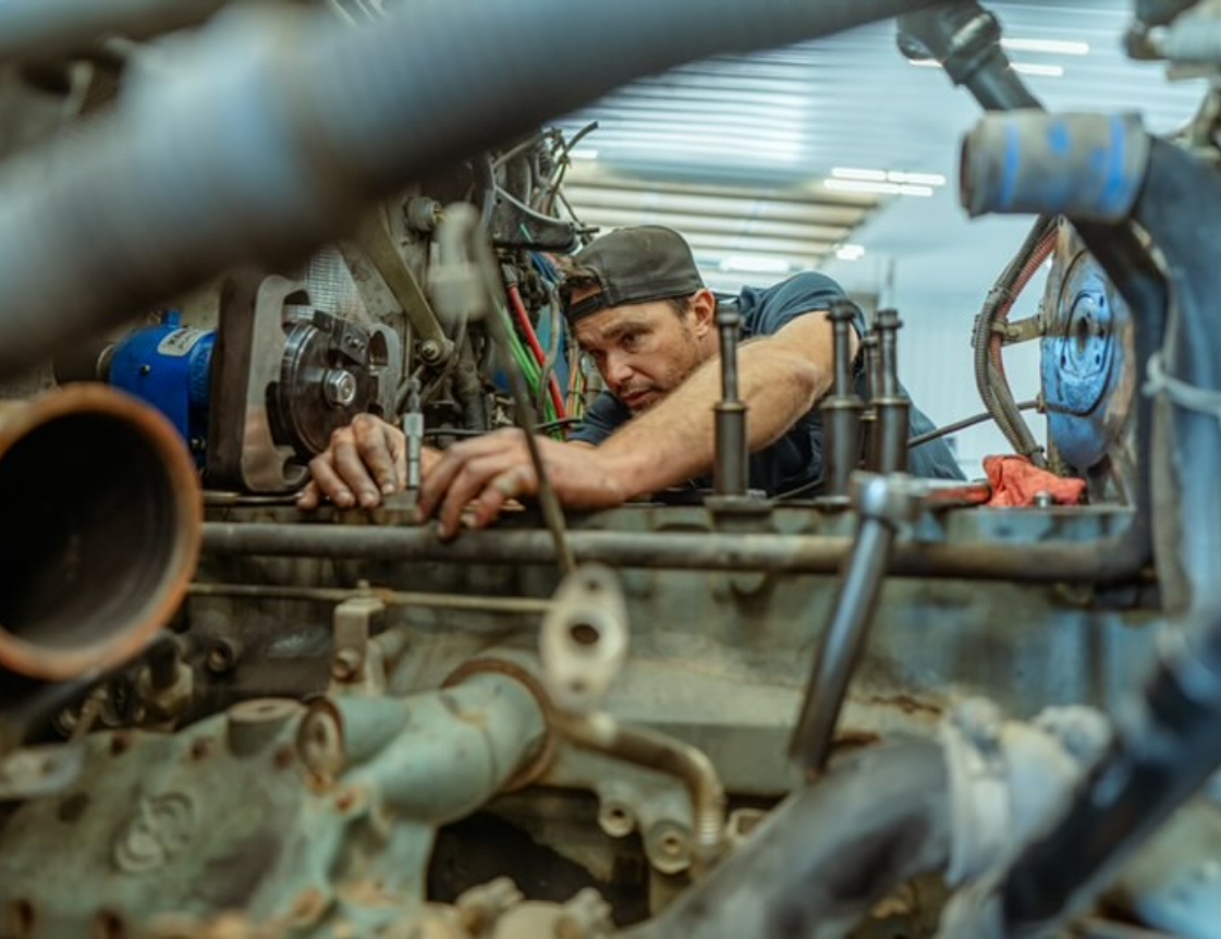 Mechanic working on truck image