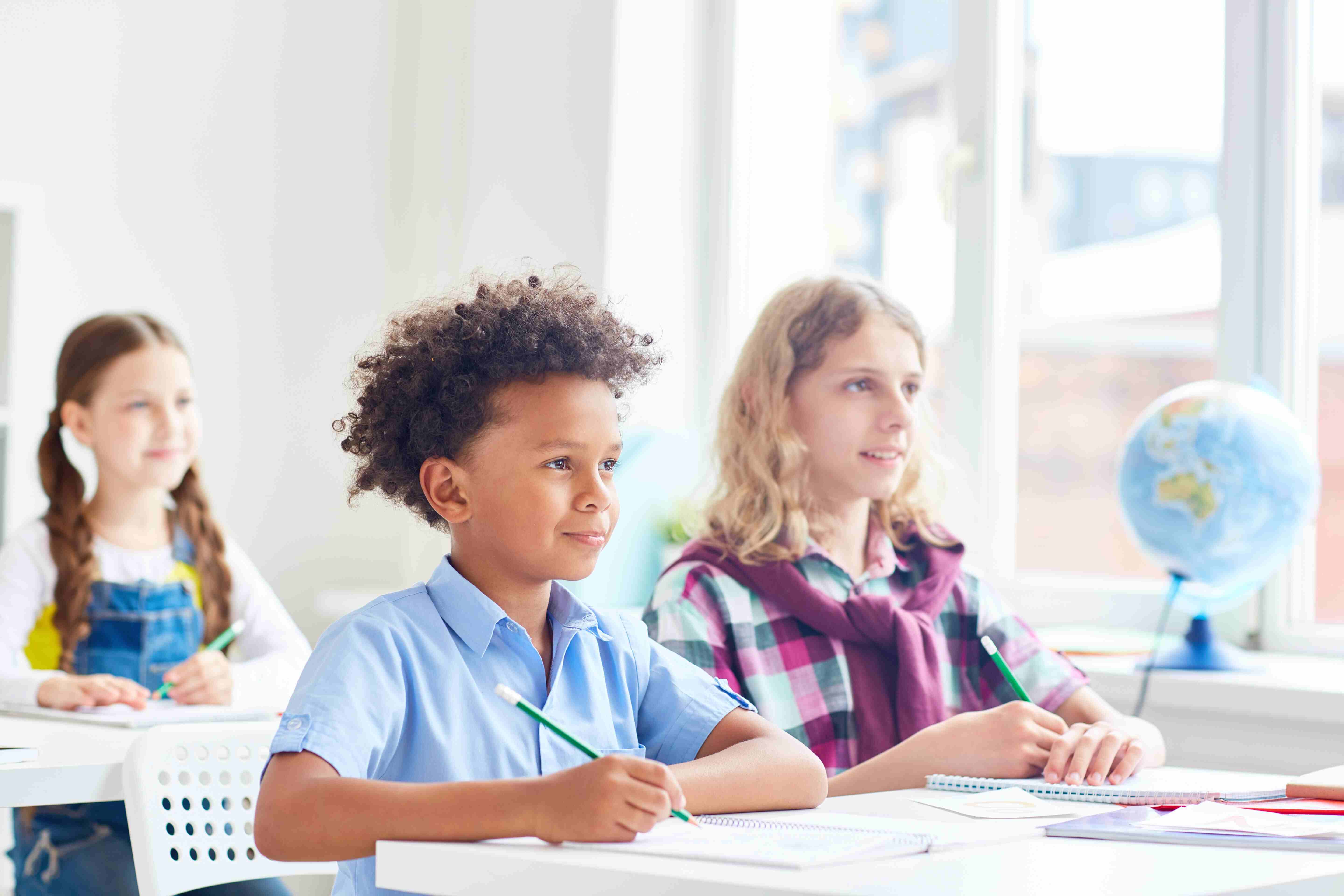 Students in class learning together