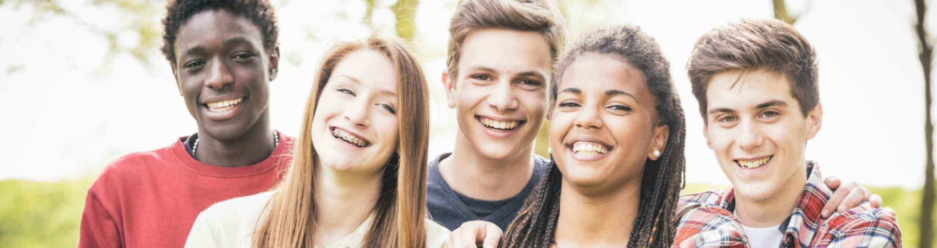Five students smiling 